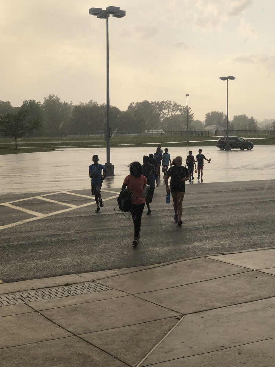 OOMSCC's tweet photo. The only thing that can stop yoga in the rain is thunder. #safetyfirst #practiceover https://t.co/eU9JDRPoHD