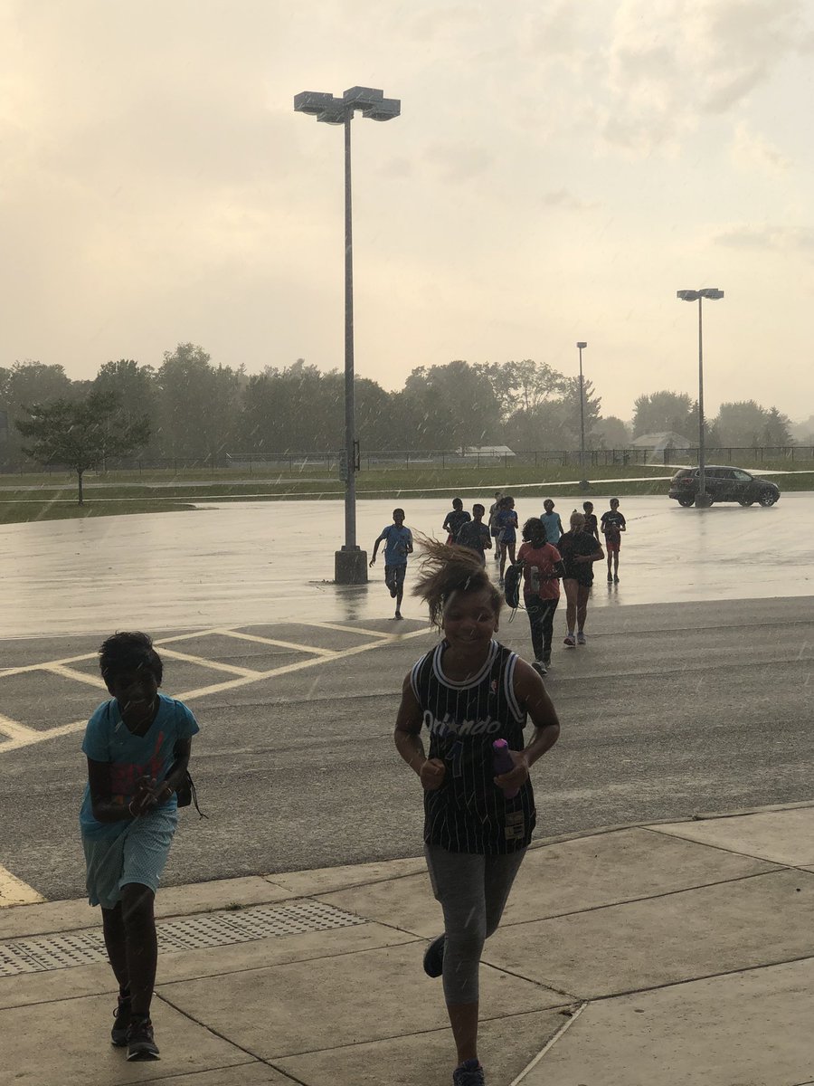 OOMSCC's tweet photo. The only thing that can stop yoga in the rain is thunder. #safetyfirst #practiceover https://t.co/eU9JDRPoHD