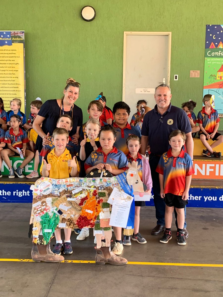 NTCattlemen's tweet photo. NTCA CEO @ManikTerritory presents Rosebery Primary Special Needs Class and teacher Ms Kendra Jones with their iPad for their winning entry in the #CowsforSchools19 competition, judged by visitors to the Darwin Show.

It was a standout winner - great work, kids! https://t.co/mkxJlhSBU3