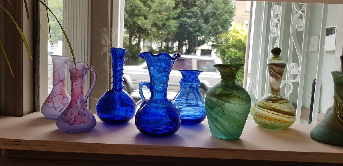 CafePalestina's tweet photo. Palestinian glass from Hebron at Cafe Palestina https://t.co/abyWlaYnJH