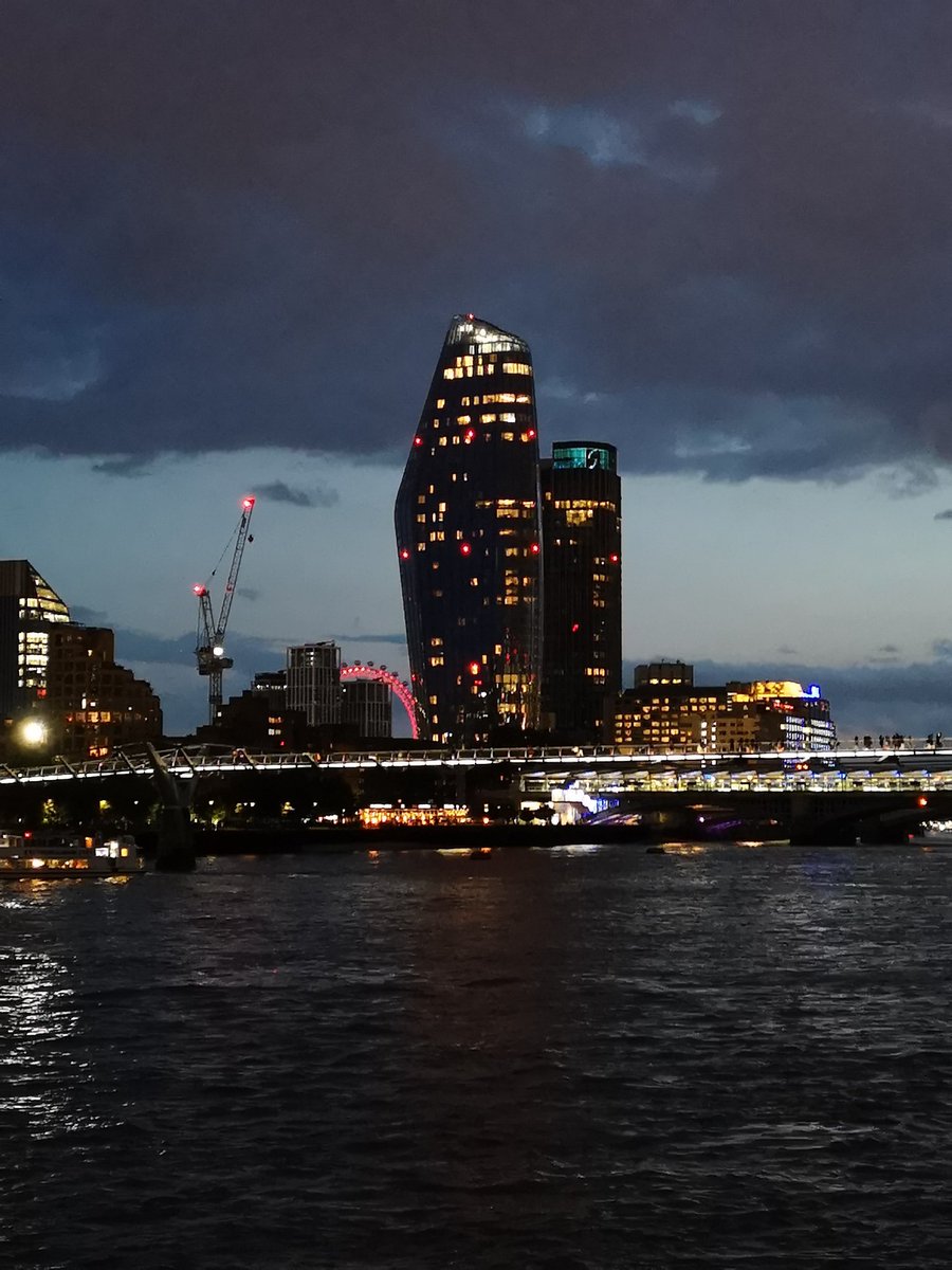 ashish_saiv's tweet photo. Two lit landmarks @TheLondonEye in the background and the Millennium bridge with dynamic white capturing commuters walking @illuminatedriv #myilluminatedriver @Signifycompany https://t.co/2WeQdiDbfI