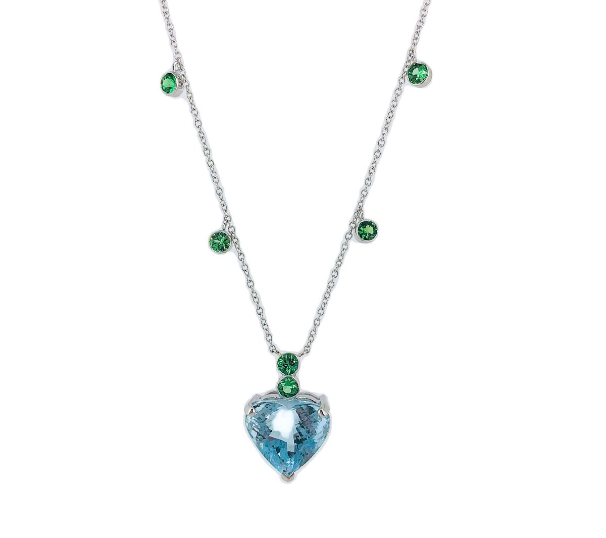 TomFrenchJewels's tweet photo. Another new &amp; fabulous jewel to the Tom French collection is this 10.24ct Aquamarine heart necklace complemented by vibrant green Garnets! The colour contrast is just stunning. #aquamarine #garnet #necklace #ascot #heart #jewellery #tomfrench https://t.co/JogxbxP1UB