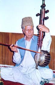 Ustad ghulam Mohammad Saznawaz playing saz e Kashmir. A string instrument much like surbahar ravan hatha or on ishraj? Said to belong Kashmir onlyIndian musical instrument
