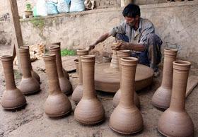 Called tumbaknaer or tumbaknari an musical instrument made of clay. One of most popular accompanying many musical traditional singing in Jammu & Kashmir. Unique. Baked clay. Provides resonanceIndian musical instrument