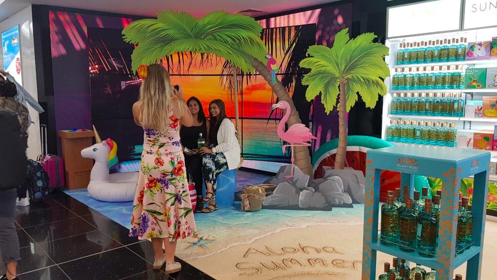 ABM_Experience's tweet image. Passing through @Gatwick_Airport? Don't forget to check out our #AlohaSummer installation at #Dufry showcasing a selection of #Summer offers from @SilentPoolGin, Sunny Life and @Polaroid