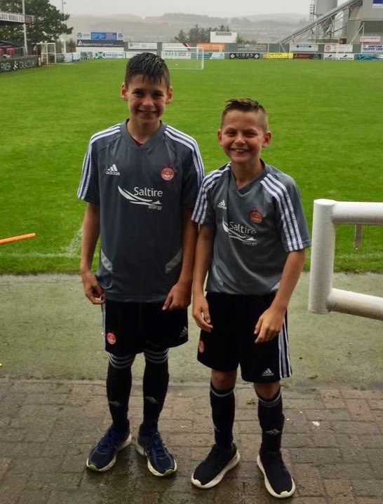 KenRamseyer's tweet photo. @AFCCT Soaking but still smiling! Thanks 2 all of the coaches @ #TrainLikeAPro this week, the boys had a great time! They really enjoyed the mix of practical / theory sessions and getting to meet some Aberdeen Players! @AaronScully19 @StephenBoddie @Scott_Duncan88 https://t.co/WTwRYIzw4u