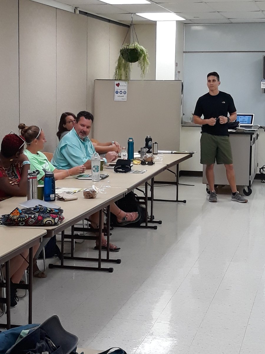 Assistant Principal Josh Flores leads some learning with the middle school staff this morning at the Saint Louis Zoo.
