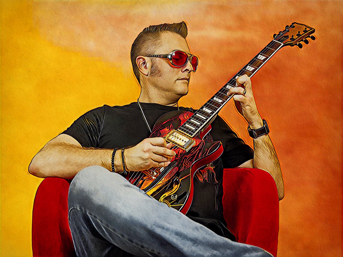 TheDangerKatt's tweet photo. Playing my Moriarty Signature Model #guitar by #luthier Tod Harris - contact Tod at @HOgRiddin for your #customguitar needs! The Moriarty bears the cover art from my #MORIARTY #comics, drawn by @artofant! Photo is by rock star @alexxcalise, #RawkPortrait edits by me! #music https://t.co/nTIPNLJo8k