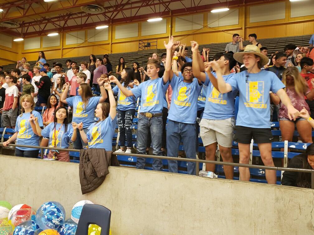 Can’t hide that Pioneer pride!!! Fish Heads locking pinkies during our school song. #Bos360