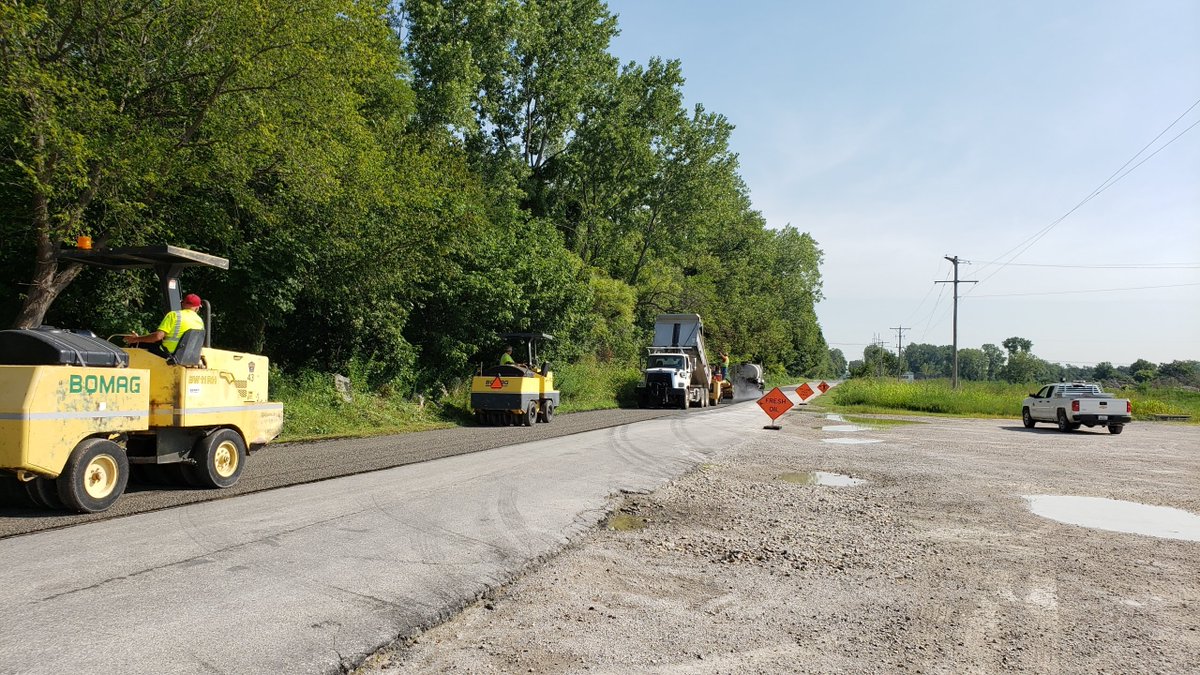 LVCountyKS's tweet photo. Leavenworth County Public Works Crews are well into the chip-seal season. The chip-seal process has a ‘train’ of vehicles that work on this crew. Make sure to drive with care when encountering a chip-seal work zone. #LVCOPW #MoveOverKS #Asphalt #ChipSeal https://t.co/MQDp9pWZOi