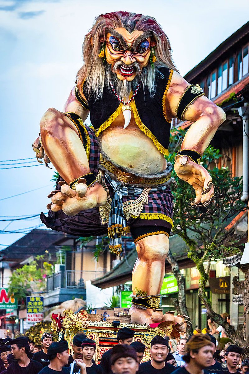 Masterfile's tweet image. In mid-March, the annual Ogoh-Ogoh parade takes place in Bali on the eve of Nyepi (Balinese New Year) and features terrifying handcrafted giant demons marched through the community as a path to purification. buff.ly/2IOUbAL