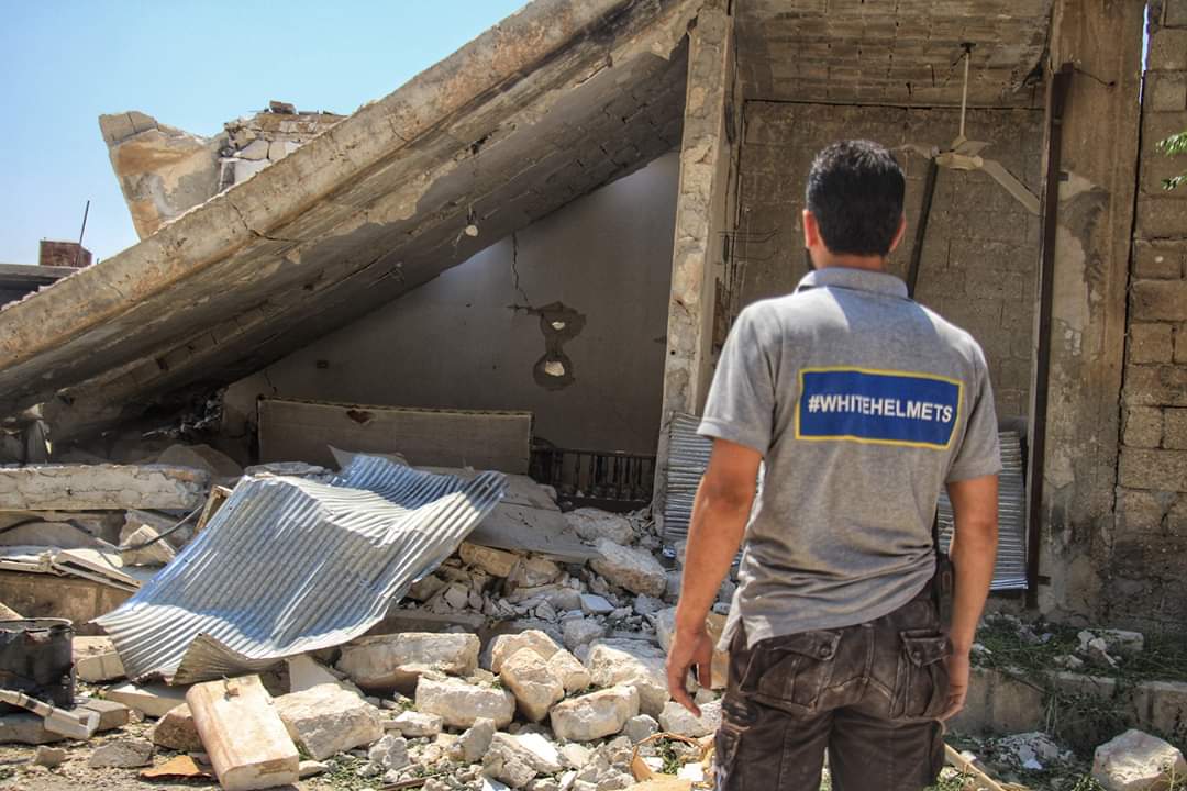 Moudr ,one of my colleagues of #WhiteHelmets , inspects his home in #Khansheikhon after a huge wave of bombing on the city.