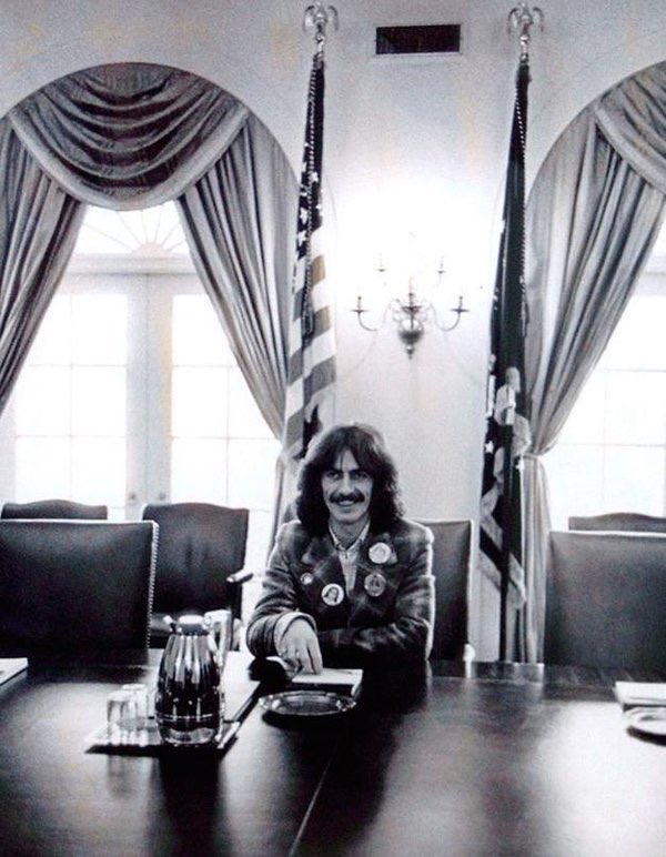 BeschlossDC's tweet photo. George Harrison sits in President’s chair at Cabinet table, White House, 1974: #Kennerly https://t.co/X1wXfB6MqU