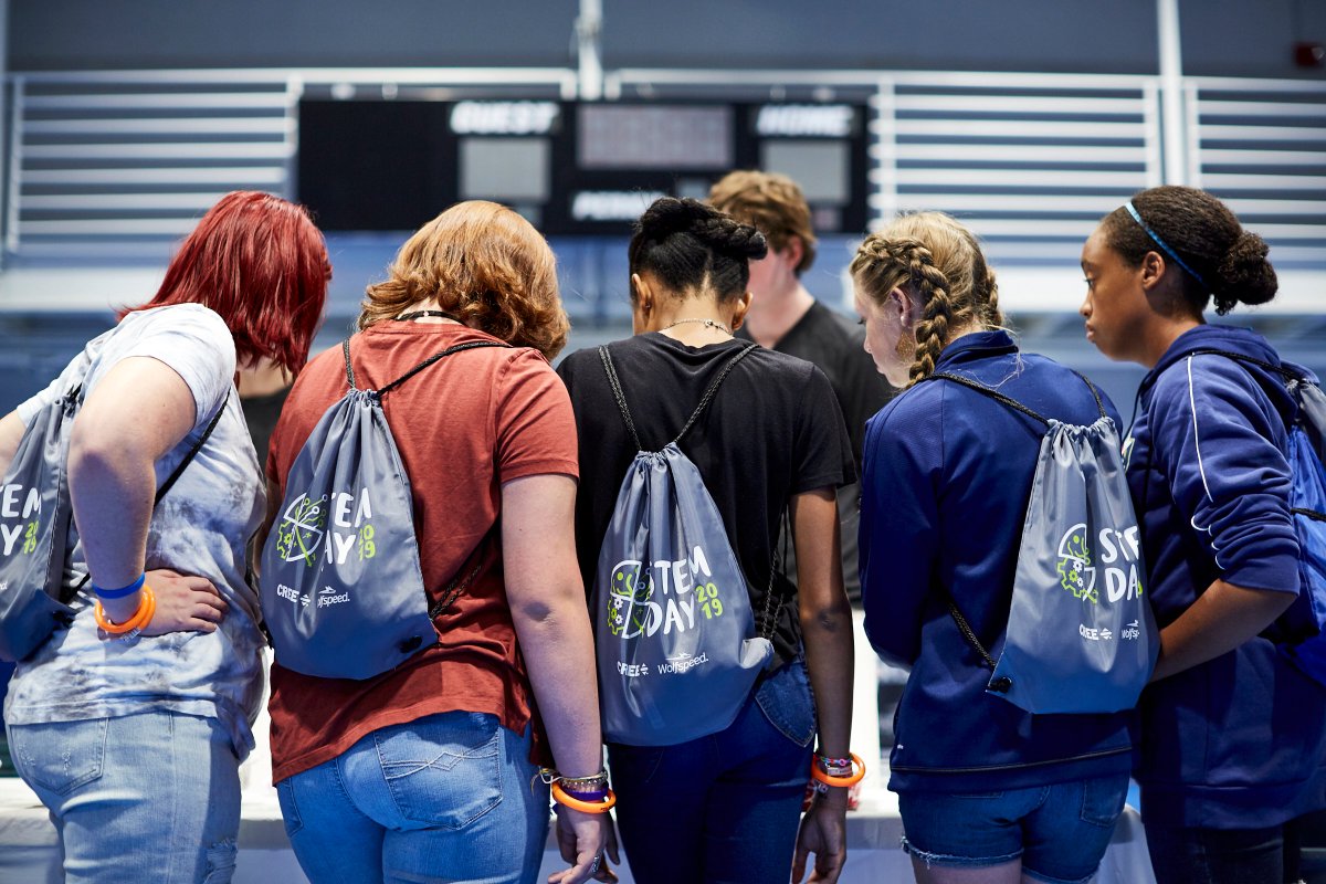 Wolfspeed's tweet image. More than 100 kids from @WakeBGC and more than 200 employees and their children are taking part in the fun by experimenting with LEDs, robotics, building bottle rockets and air cannons, racing with engineers and more. #PoweringOurCommunity #STEM