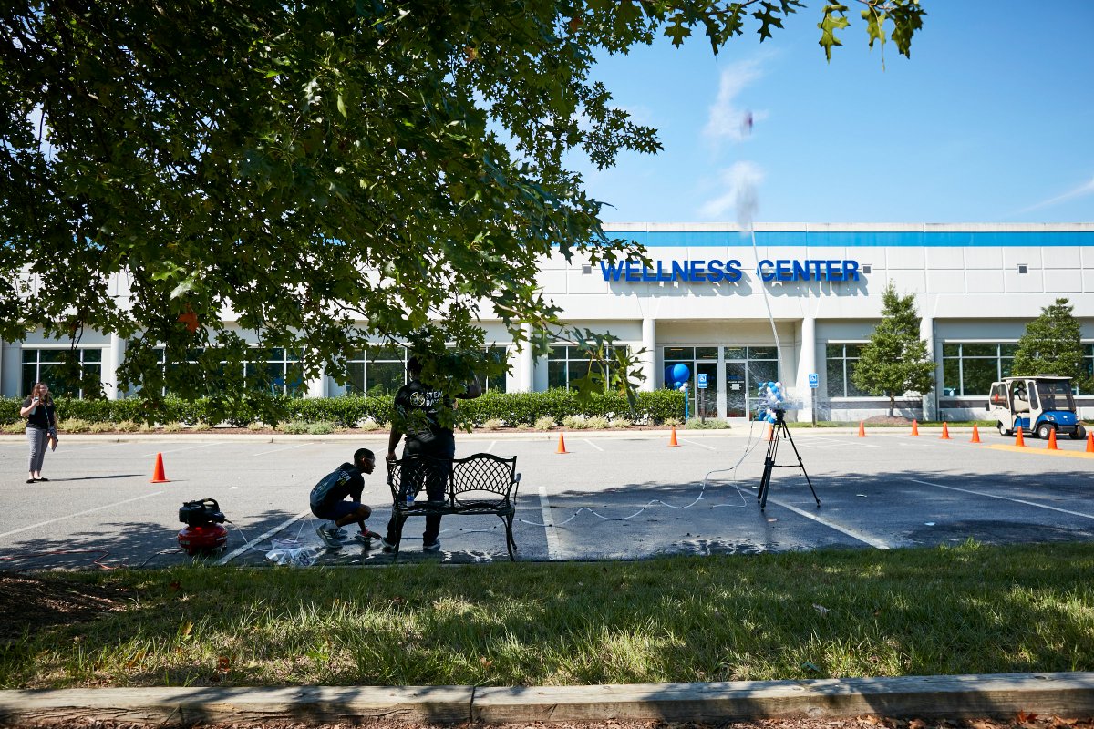 Wolfspeed's tweet image. More than 100 kids from @WakeBGC and more than 200 employees and their children are taking part in the fun by experimenting with LEDs, robotics, building bottle rockets and air cannons, racing with engineers and more. #PoweringOurCommunity #STEM