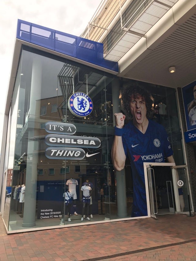 TrollFootball's tweet photo. Chelsea had just finished changing the face of their megastore from Eden Hazard to David Luiz. Life comes at you fast. https://t.co/NJjZaDWzXY
