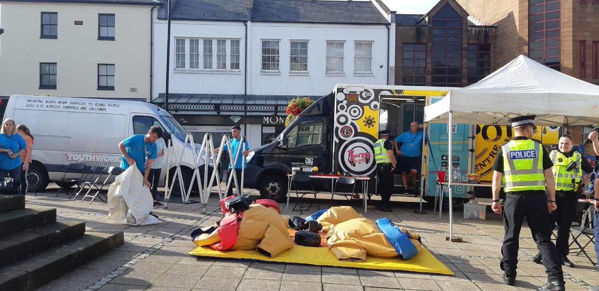 NithsdalePolice's tweet photo. #Dumfries Community Cops are in Queensberry Square at @YOUTHWORKDG  Pop up Village. Our partners @DGfire_safety &amp; @dgcouncil are here too. Come along &amp; see whats going on. #sumosuits #mypod #partnershipworking #communitypolicing https://t.co/tJxmAoz3Lj