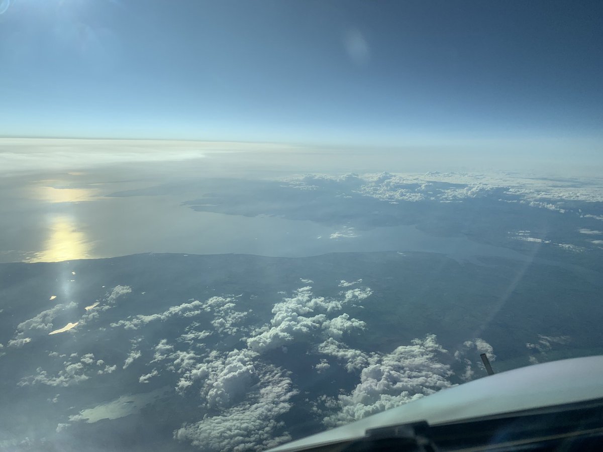DaveWallsworth's tweet photo. Office window shots again. Solway Firth. Ailsa Craig (as remembered from Pro-Celebrity Golf with Peter Alliss 😄). Greeland. And mountains just east of @yvrairport #bestofficewindow https://t.co/YOXy1lZ6vE