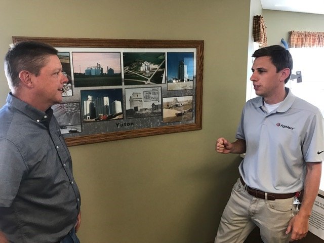FarmWeekNow's tweet photo. #AgriVisor manager Joe Camp, right, discusses the #harvest19 outlook with Todd McTaggart, grain department manager of the #EvergreenFS Yuton elevator. Camp will travel across 8 states the next 10 days as part of the new AgriVisor Harvest Preview Tour https://t.co/woaPBJrFpd