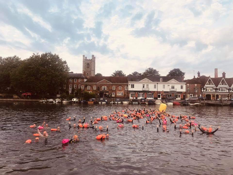 I'm surrounded by people covered in black rubber and one of only a handful of non wetsuit swimmers. Can you see me? ;) #swimming #selkie #swimstory