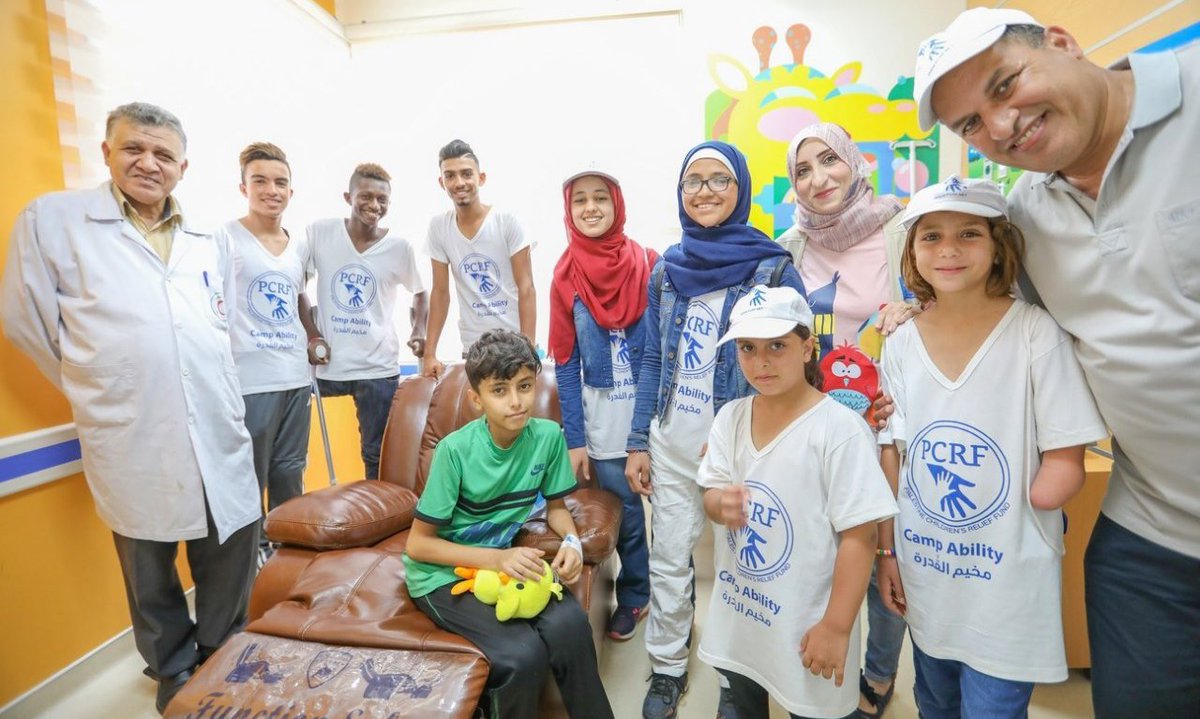 ThePCRF's tweet photo. Kids from #CampAbility recently visited patients at our pediatric cancer center in Gaza. Here, 12-year-old Oday, who is the department for treatment of Hemophilia, meets the kids, many of whom were also sent to the USA for treatment by PCRF over the past few years. https://t.co/lgUGQ6wq31