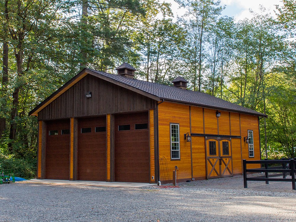 BarnProsWA's tweet photo. Model spotlight: The Tradesman! With clear-span trusses for unobstructed storage and  over 14 ft of sidewall height there's a lot this "shed" can do. #barngarage #polebarn #barnpros https://t.co/T6WgqaKTG0 https://t.co/PuBTLRUdS5