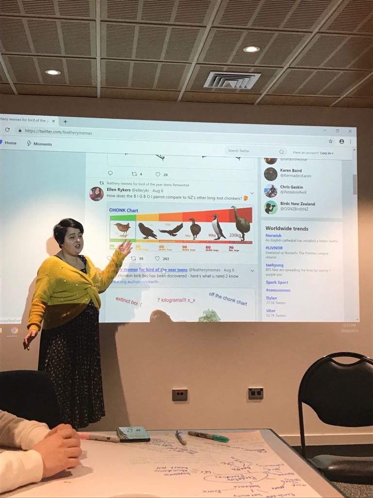 Adam_Currie_NZ's tweet photo. @kimi_collins from @Forest_and_Bird attempting to explain the glory that is @featherymemes at #ConsComms
@VoteTakahe @birdoftheyear https://t.co/NWHZMrKokd