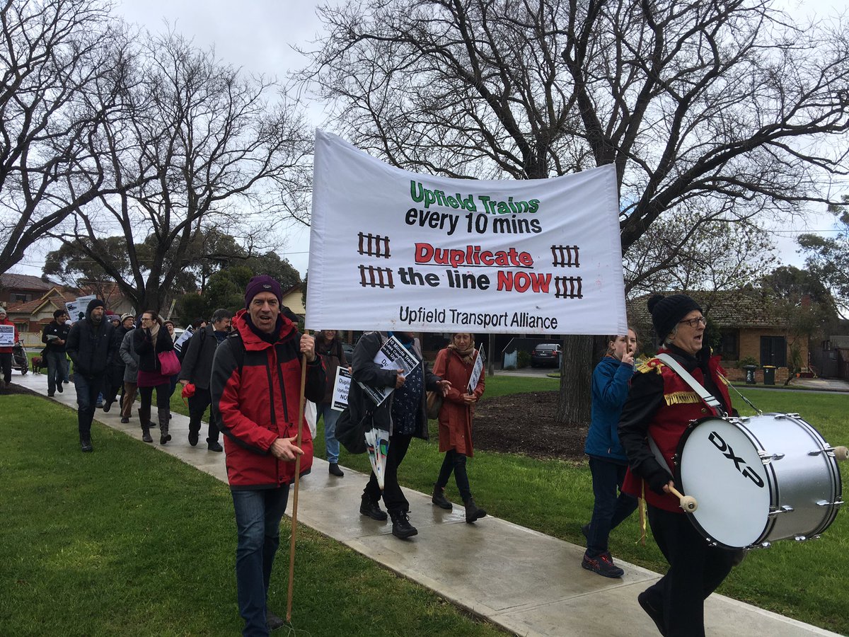 UpfieldUpgrade's tweet photo. People on the march in #Merlynston for more trains on the #upfieldline Duplicate the tracks. #upgradeupfield #springst @DanielAndrewsMP @JacintaAllanMP @Frank_McGuire @TimRRead @JennyMikakos @FionaPattenMLC https://t.co/z6coZm9Hlc