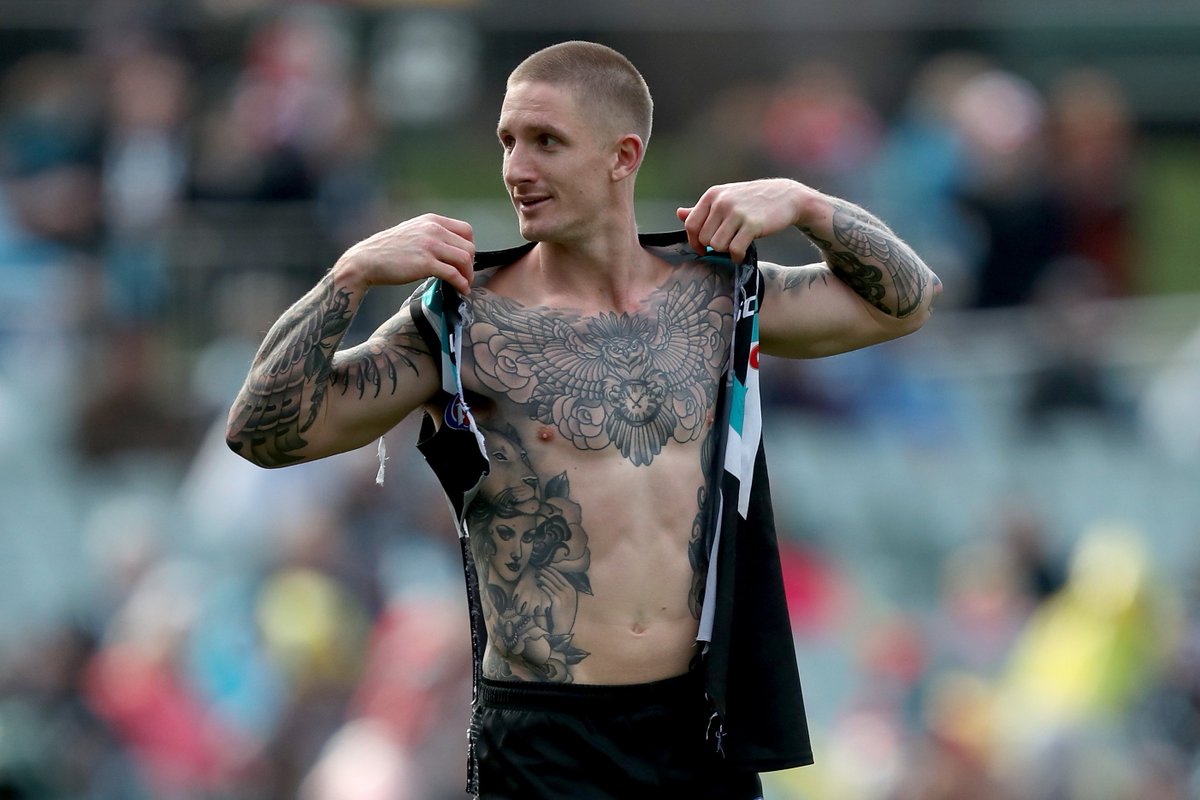 PAFC's tweet photo. Hammer modelling our new lace up jumper 🙈

#AFLPowerSwans https://t.co/eiP9w2QL84