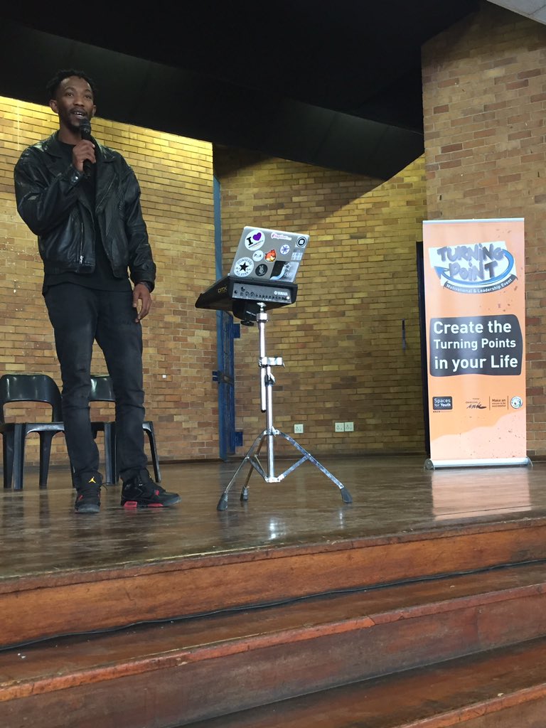 spaces4youth's tweet photo. Live on stage @PASTABDXLL at @spaces4youth #turningpoint, sharing his #turningpoints #geboreengemengineldos #webelieveinafrica #eldoradopark #loveisworkmadevisible https://t.co/bEIfmMc4p9