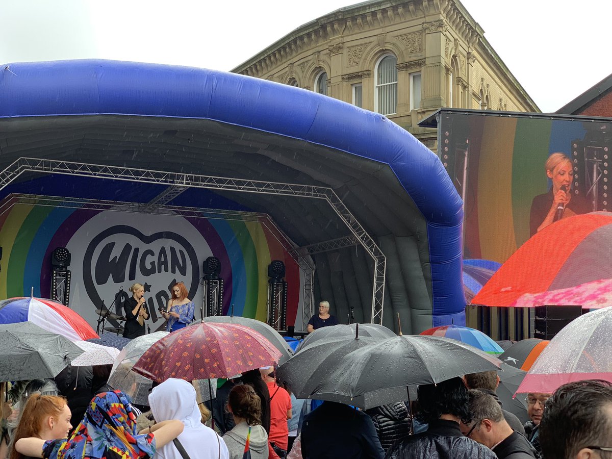 Arrived at @WiganPrideLGBT and bumped into Castro Cat (and @justaballgame, @craigjohnharris). It’s busy, lively and lovely in Wigan today, despite the rain. #Equalitywins