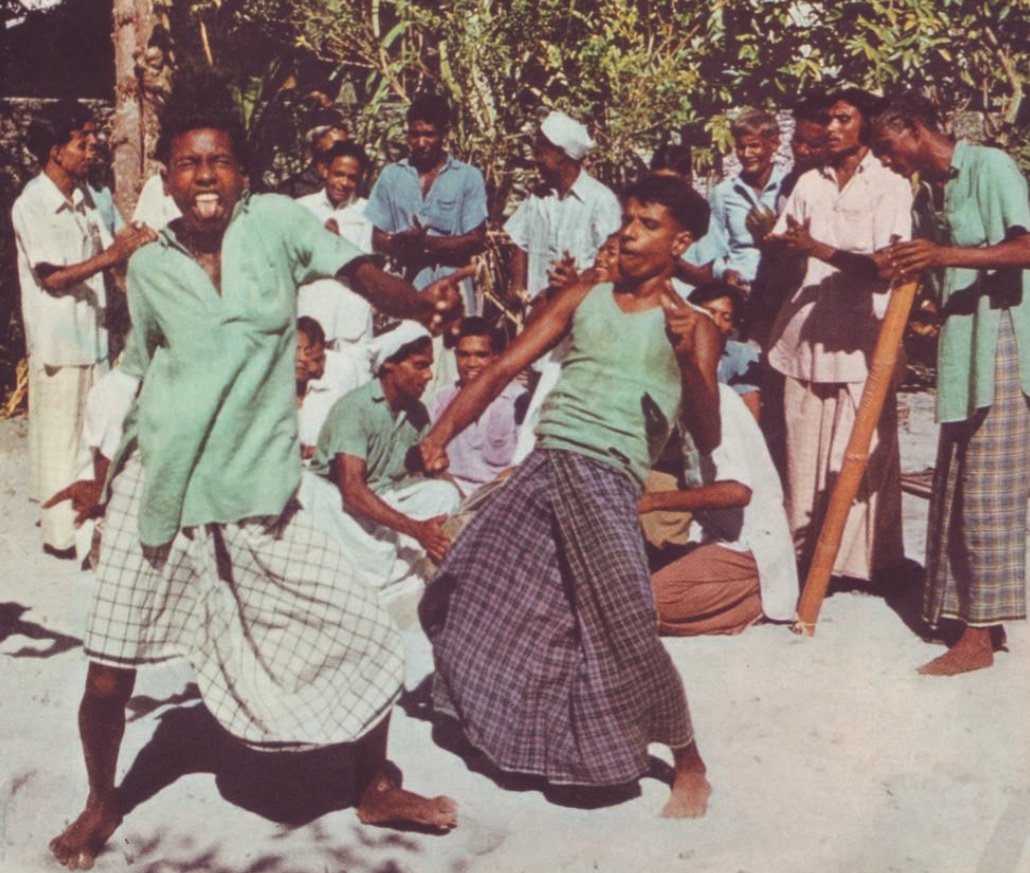 Full of laughter &amp; contentment, untouched by sophistication, Maldivians lead happy carefree lives. Comic faces are an essential part of this performance. Whiles the boys twist and stamp, orchestra members clap hands &amp; beat the drums and bamboo tubes.
📷 Allan Villiers 1957 NatGeo