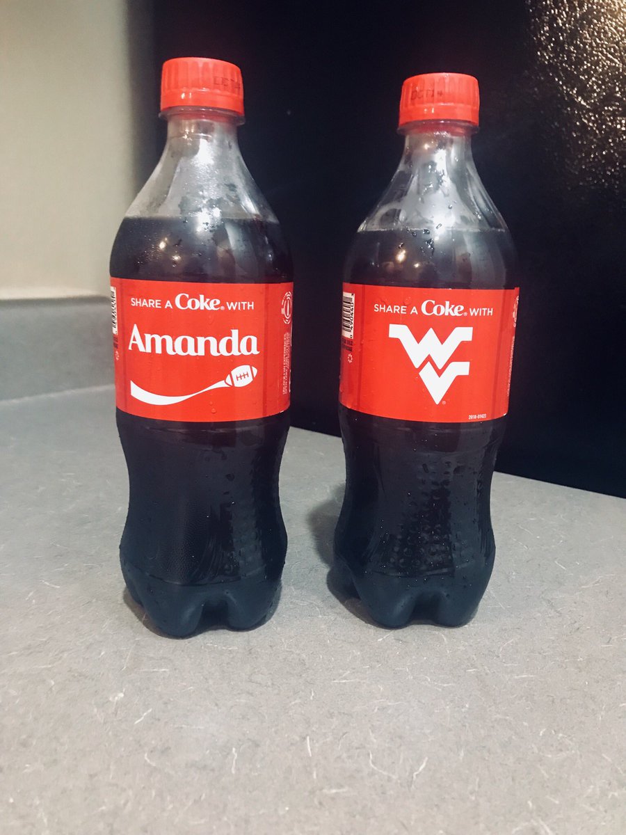 Ms_D419's tweet photo. Checked out at Walmart and these two bottles were beside each other in the fridge! #WestVirginiagirlforlife https://t.co/kbeW7jdfmB