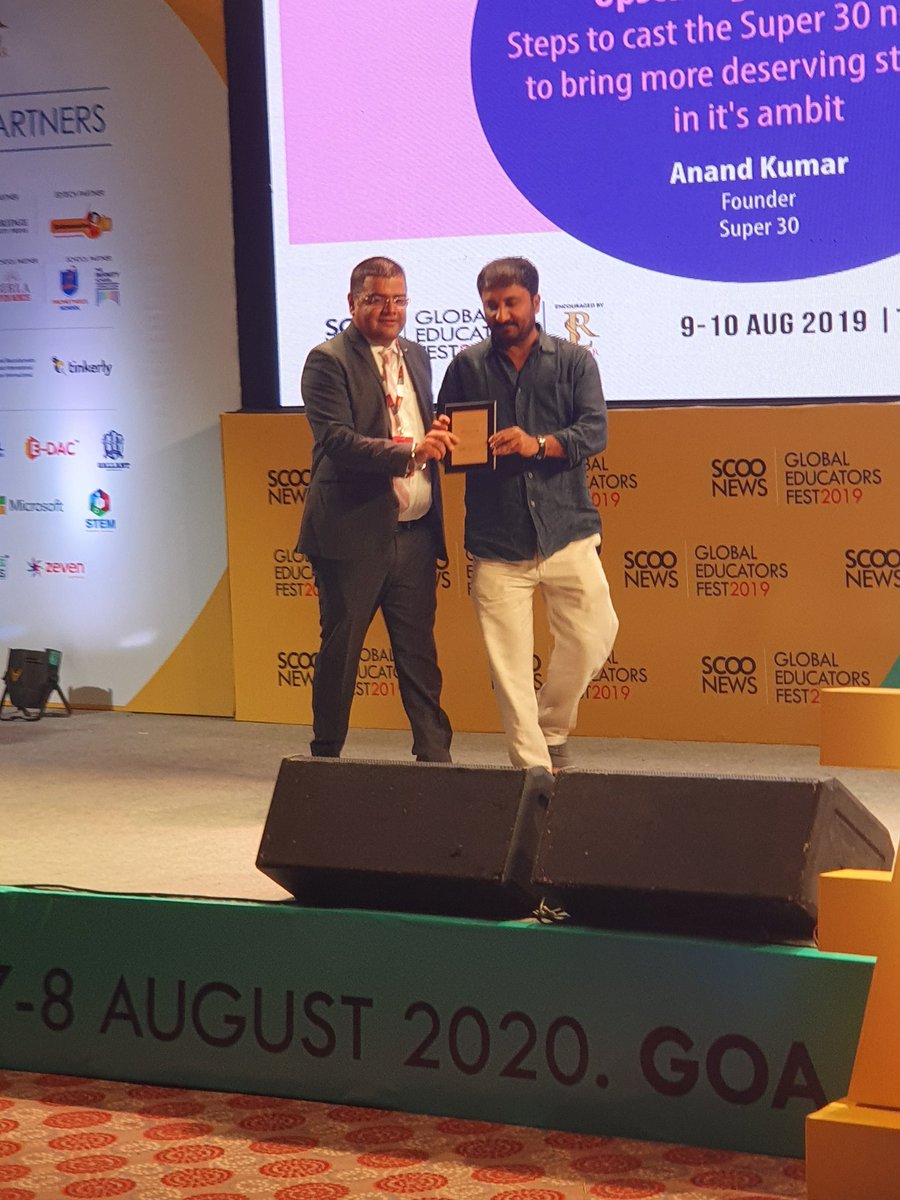 ashokkp's tweet photo. Anand Kumar of #Super30 fame felicitated by @santlani @ScooNews  #SGEF gets standing ovation from the audience including Hon'ble Governer of Punjab, #Inspiring story of grit, courage, struggle, success. https://t.co/jRYvKlqE2p