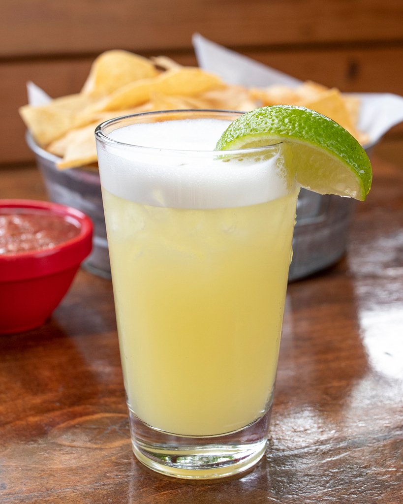 The closest thing to the beach in the heart of Atlanta, The Beach Bum cocktail, made with 1800 Coconut Tequila, Orange Liqueur, Pineapple Juice, and fresh Citrus. 
.
.
.
#iAmTL #tinlizzys #1800tequila #texmex #saturday