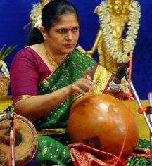 Smt Sukanya Ramgopal stared as a violinist with T.H. Gurumurthy before switching to mridangam &  #ghatam with T.H. "Vikku" Vinayakram for 20 years. In 1992, she was the first to perform on the ghatam tharangam  #ghatam Indian musical instrument