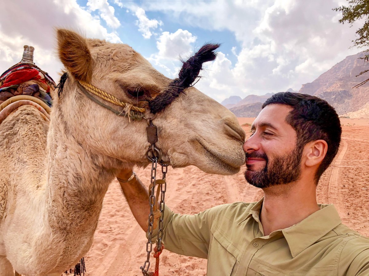 NBCTheVoyager's tweet photo. Josh always enjoys meeting the furry locals while cruising around the world! What was your favorite moment from today's episode in Aqaba? #TheVoyager https://t.co/tF0JI6Hp23