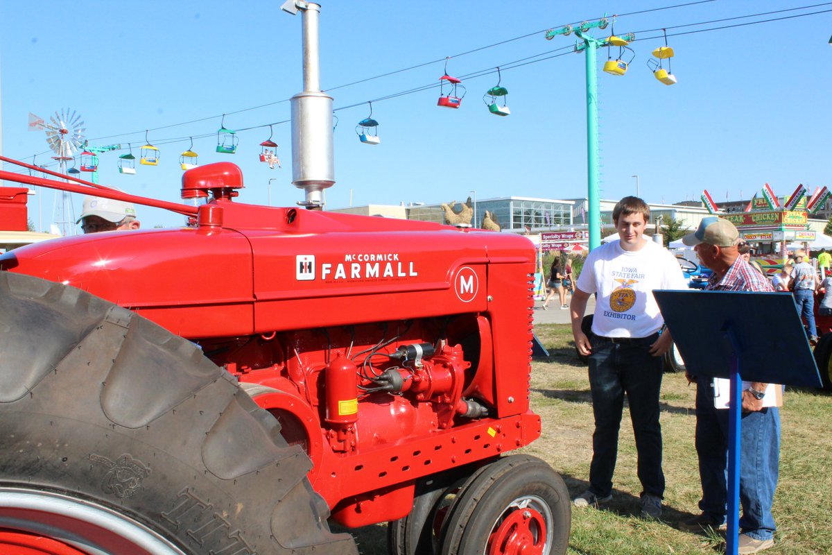 NevadaFFA's tweet photo. Congratulations Jacob &amp; Zach Larson on blue ribbon on your Farmall M tractor at Iowa State Fair #tractors @IowaStateFair #nevadacubpride https://t.co/6KjhUPA2ex