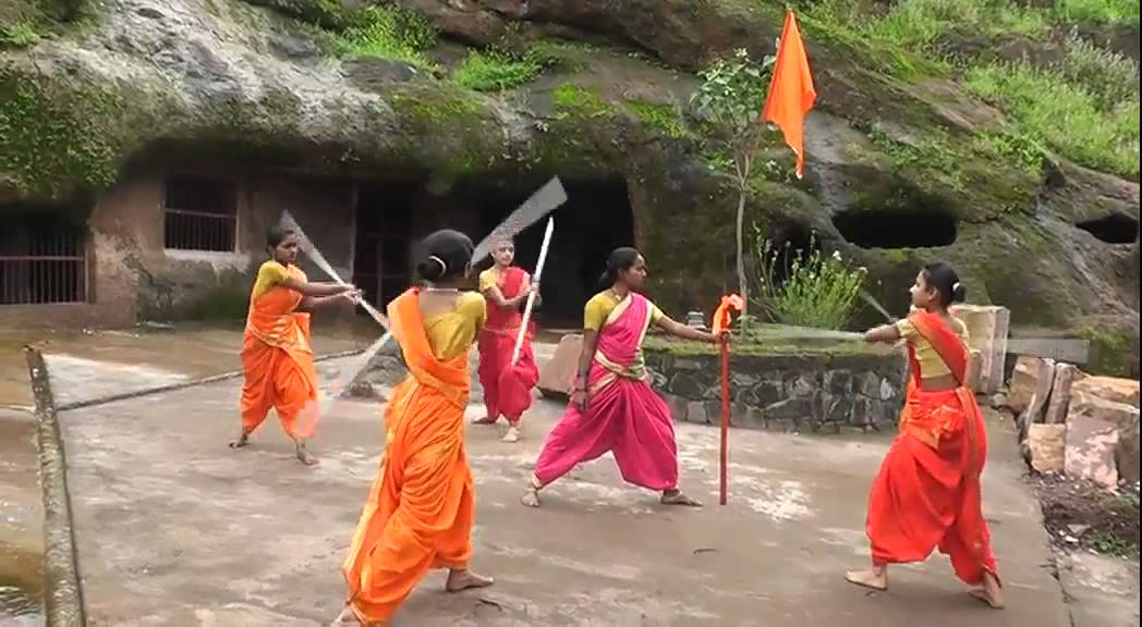 a pic i found it reminded of Rani Jhansi Laxmibai. She had a group of women trained in Indian martial arts. this is mardani khela, somewhere in MP or Maharashtra? several weapons are used. through it she ensured women participation in state affairs-security. She was trend setter