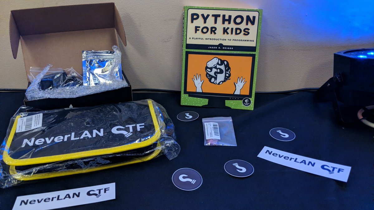 NeverLanCTF's tweet photo. Come visit us at @r00tzasylum for a chance to win some awesome prizes including a raspberry pi zero, a soldering kit, a 2FA key, and a python for kids book!! Free stickers and unlimited fun :) #teachthemtohack https://t.co/UuqOkjUYRA
