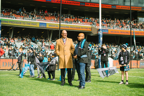 PAFC's tweet photo. It was wonderful to have @GFGWhyalla as our Game Day Partner yesterday! Thank you to Sanjeev and the Gupta family for your ongoing support of our great club and your commitment to community 🙌

#weareportadelaide https://t.co/T7OI106x0M