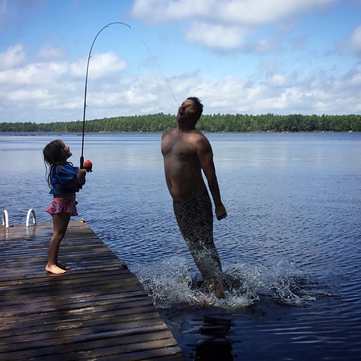 stodoe's tweet photo. Trying to relax in #halifax novascotia and be the graceful #merman that I am and these damn #kids won’t leave me alone.  #fishing #mermen #mermaid #cottagelife https://t.co/JO8yrXVoiW