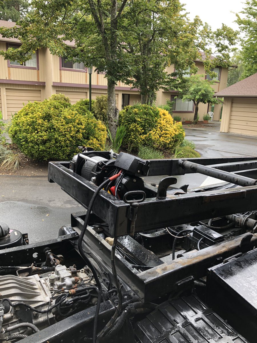 The not-so-glamorous side of running your own landscape business / working on one of our trucks, getting the new winch installed onto our bin truck #neveradullmoment #landscaping #working24x7
