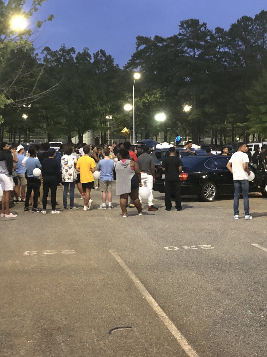 MichaelPerchick's tweet photo. Happening now: People gathering at Sanderson High for a vigil for Desmond Jenkins. The 18-year old was shot and killed overnight in Raleigh @ABC11_WTVD https://t.co/ww75fVPCyY