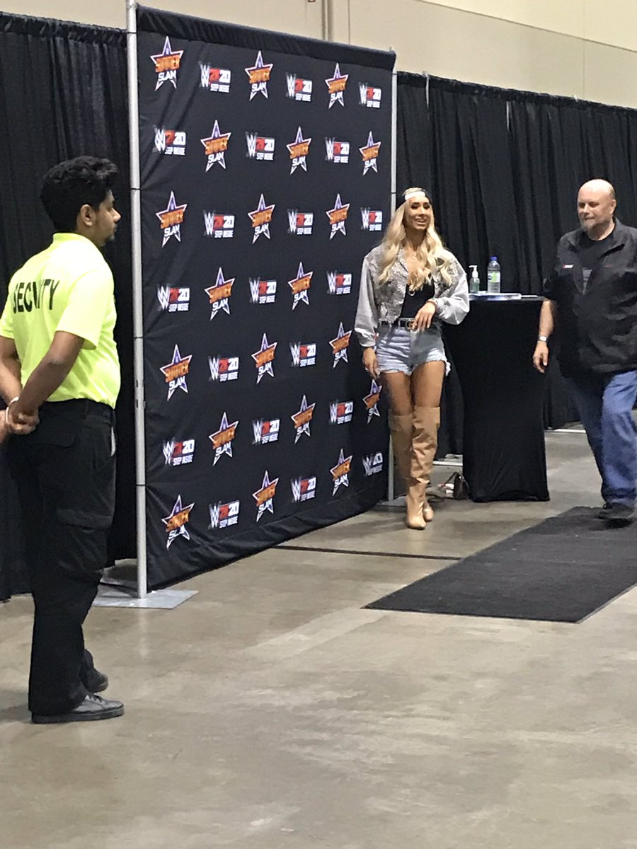 WWEFOREVERR5's tweet photo. Didn’t get to meet @CarmellaWWE face to face today because the line was closed early but still managed to take to picture of the MOON WALKING TRASH TALKING PRINCESS OF STATEN ISLAND BABYYYY! #Summerslam https://t.co/G31HyTgIKX
