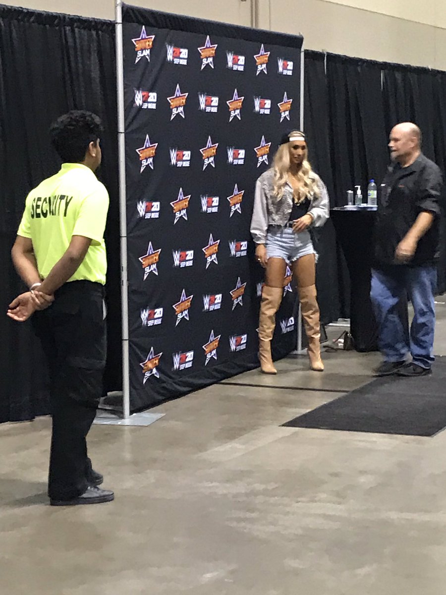 WWEFOREVERR5's tweet photo. Didn’t get to meet @CarmellaWWE face to face today because the line was closed early but still managed to take to picture of the MOON WALKING TRASH TALKING PRINCESS OF STATEN ISLAND BABYYYY! #Summerslam https://t.co/G31HyTgIKX