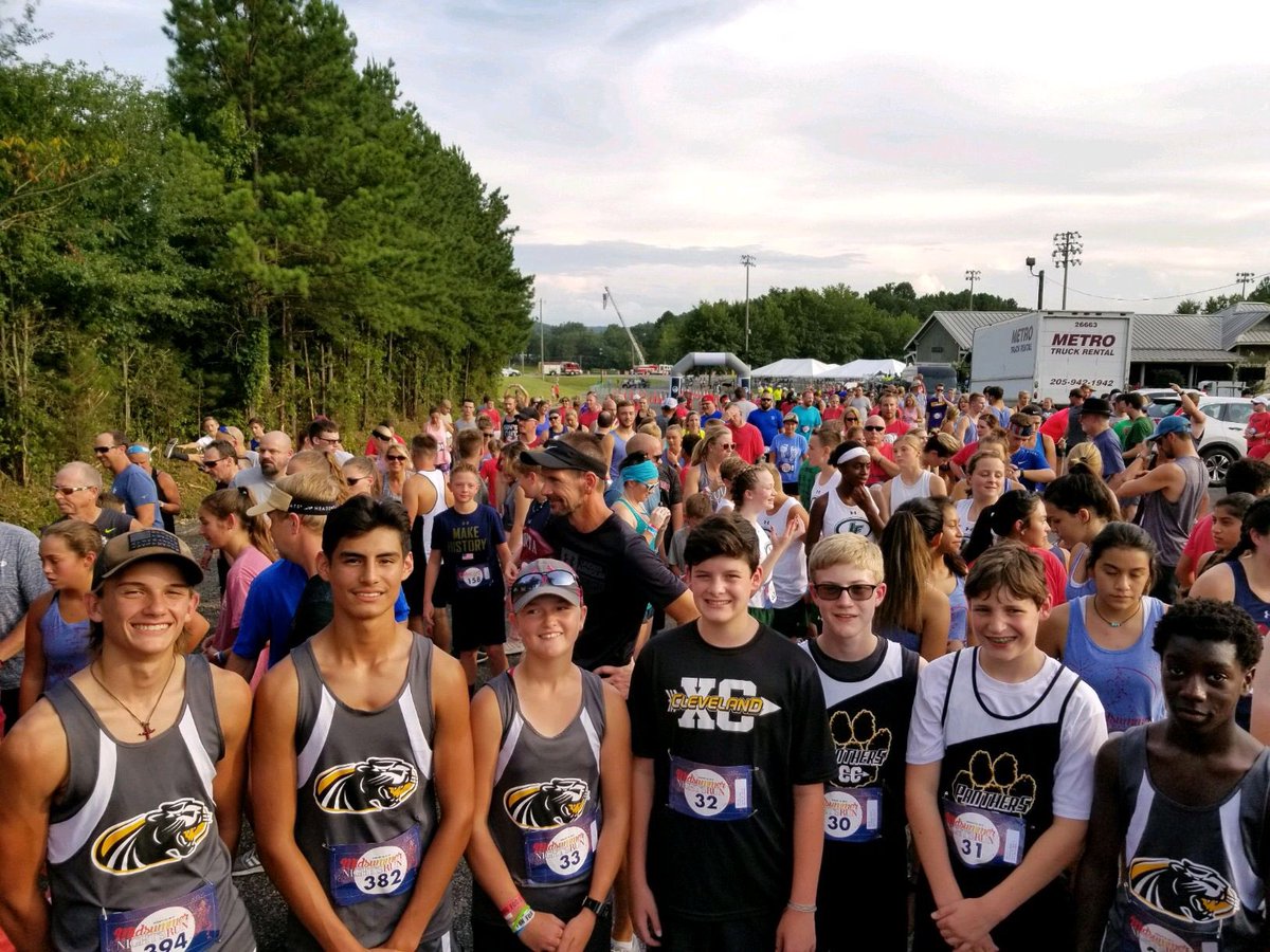 CHSGoPanthers's tweet photo. CHS Cross Country Team representing the Panthers at the Midsummer Night’s Run! Just one way to say thank you to The Blount County Education Foundation! https://t.co/IfuEO6pvus