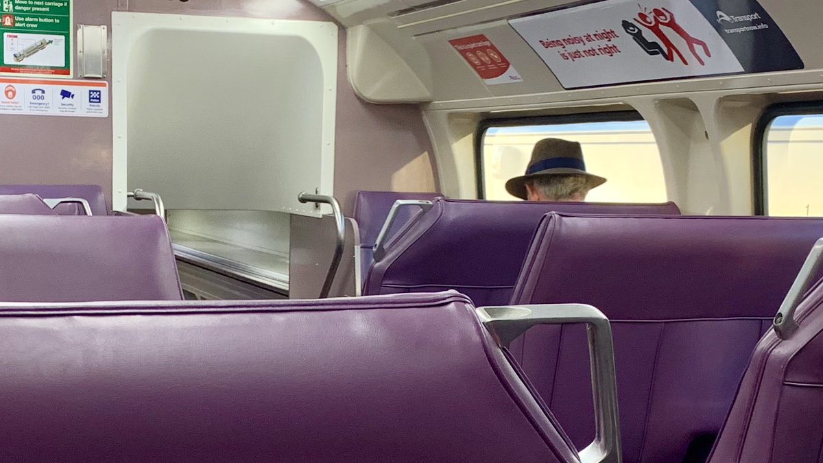 stilgherrian's tweet photo. #purpletrain, again, with fedora. https://t.co/HO27QpPTyf