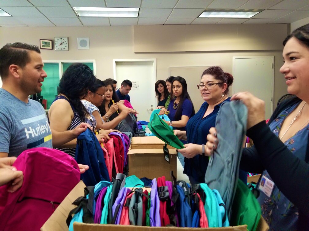 DrMayraHelguera's tweet photo. @SantaAnaUSD district office staff busy stuffing over 4,500 backpacks for the 2019 SAUSD Back to School Bash held on Saturday, August 3, 2019 // 08.02.19 #SAUSDwins #weareSAUSD #SAUSDserves #SAUSDproud https://t.co/RqEdthFBdz