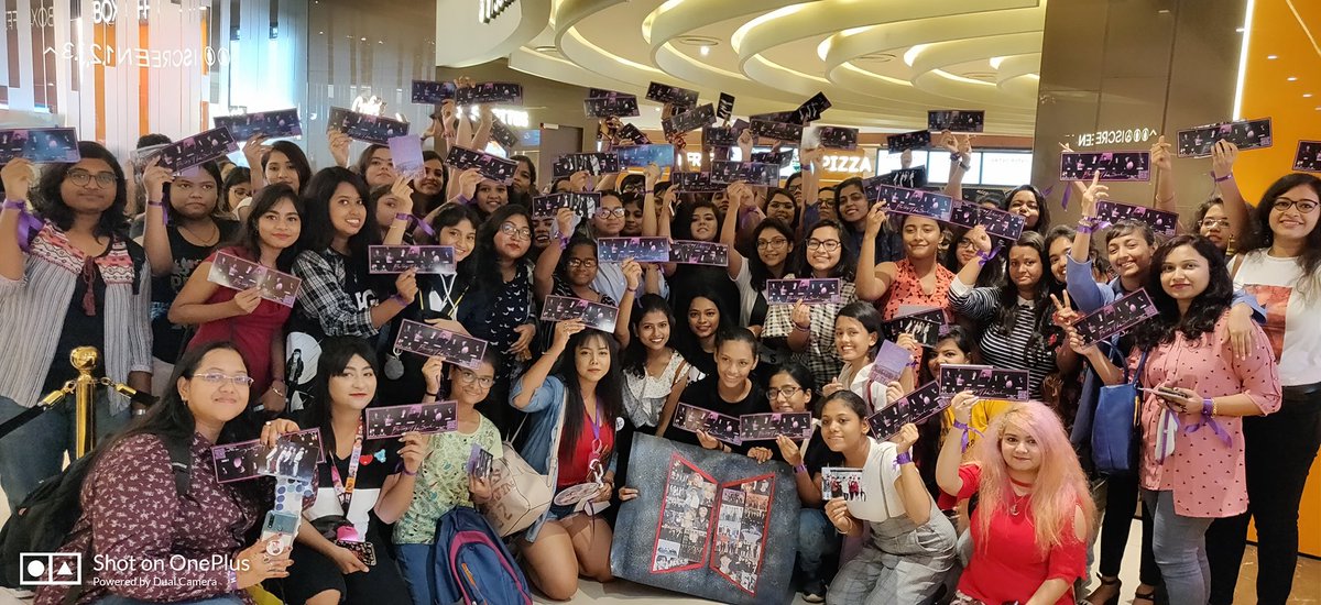 btsbengalarmys's tweet photo. INOX South City 3pm show was packed with enthusiastic Kolkata Armys! I hope you loved our banner, photocard and purple ribbons! And most importantly enjoyed the movie and had a memorable day! And @BTS_twt thank you for existing and giving us so much happiness... WE PURPLE YOU! 💜 https://t.co/R6GXEg1iV0